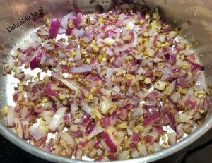 Smażenie cebuli czosnku imbiru oraz nasion kuminu